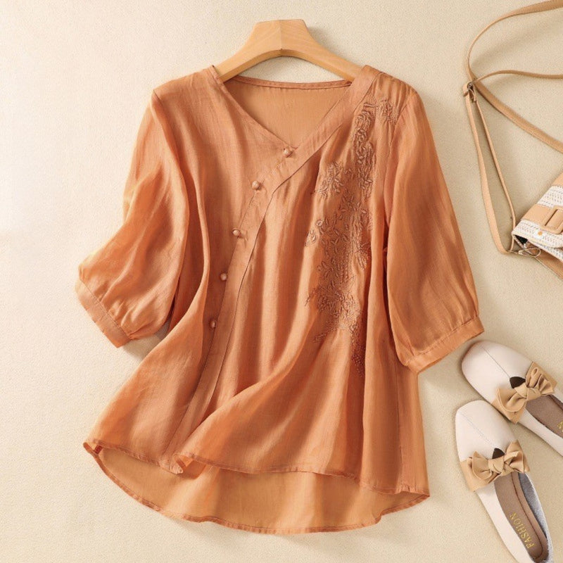 Elegant asymmetrisk tunika med knapper