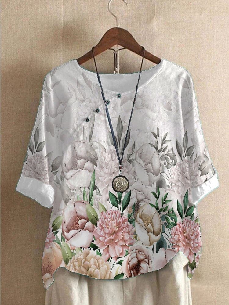 Bluse med blomsterprint og afslappet pasform