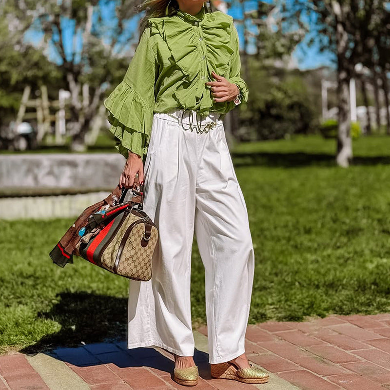 Kvinders bluse med stilfulde flæseærmer